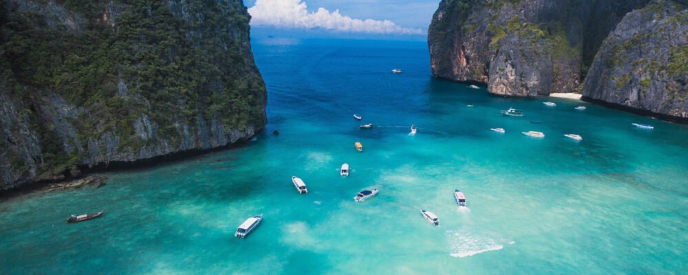 iso-republic-boats-sail-on-clear-blue-water